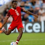 Canada defender Moïse Bombito takes a penalty shot during Copa America third place match against Uruguay