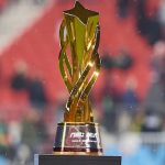 Golden NSL championship trophy displayed on a pedestal ahead of the league's second season and FIFA World Cup