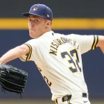 Brewers pitcher Misiorowski delivering a fastball during a game setting a record with 57 pitches over 100 mph