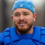 Alejandro Kirk in Blue Jays uniform walking toward bullpen during spring training in Dunedin Florida