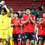 South Korean soccer players applaud fans as they leave the pitch after a comeback win against Czechia at the World Cup